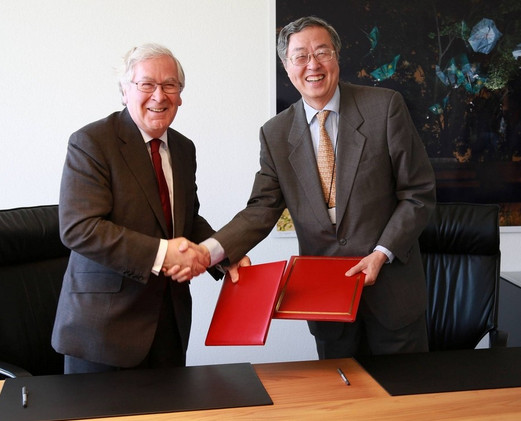 中国人民银行行长周小川及英国央行行长Mervyn King